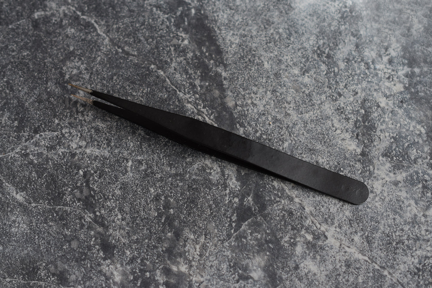 Tweezers.