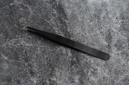 Tweezers.